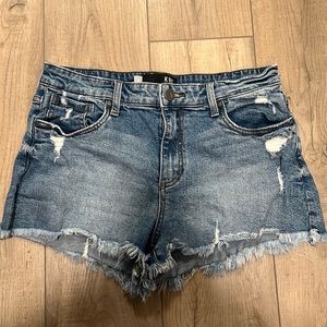 Distressed denim shorts